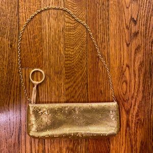 BCBG Max Azria gold zipper clutch with chain